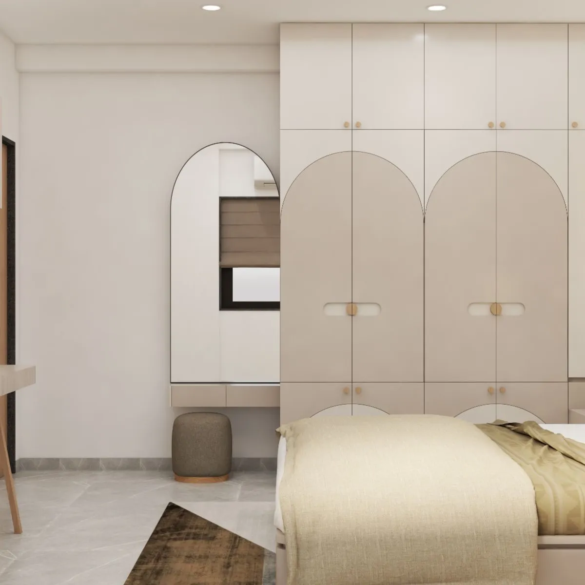 Elegant bedroom dressing vanity featuring an arched mirror and custom beige cabinetry