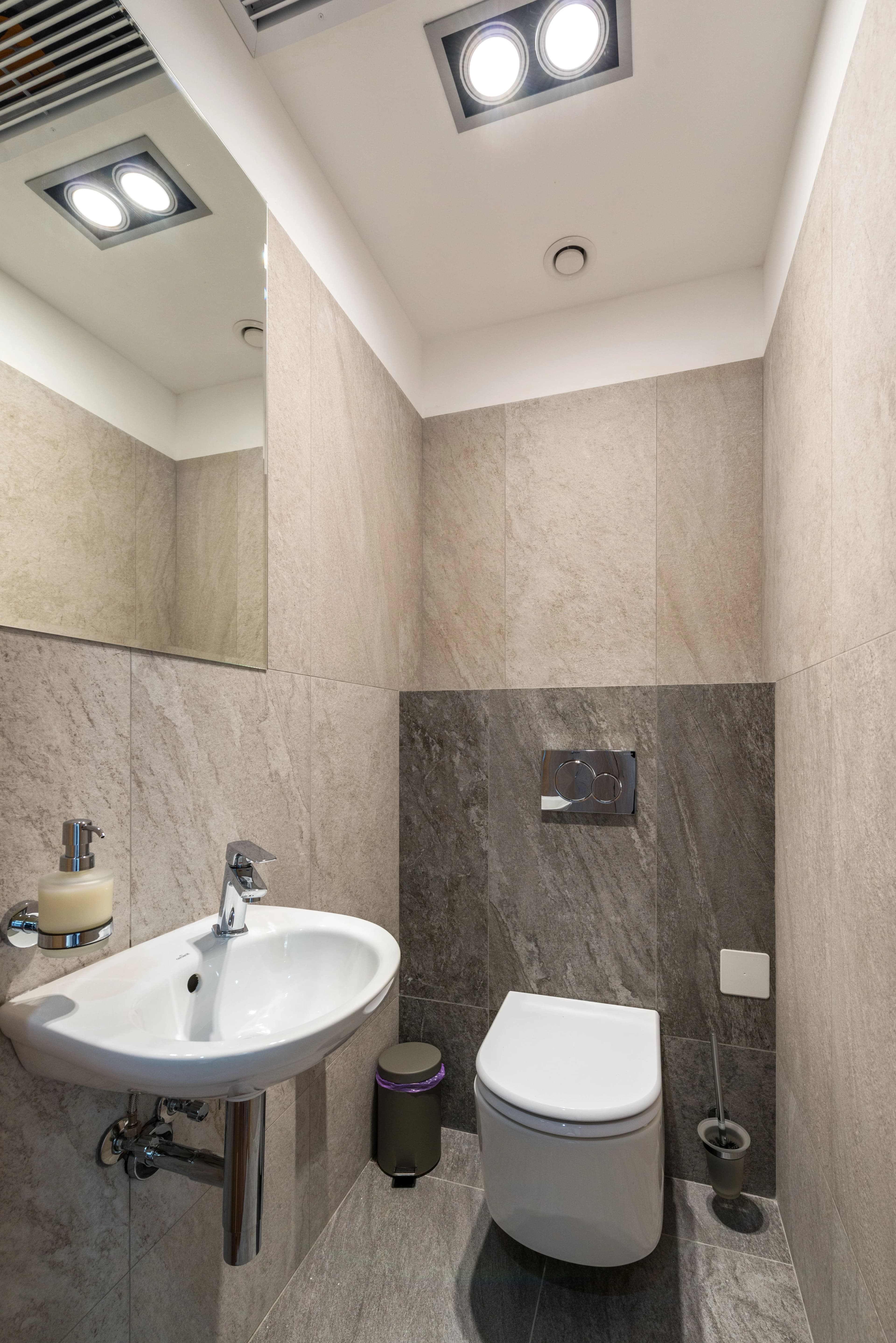 Formal marble washroom space